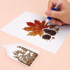 Close-up of drills being placed on a Autumn Woodland Friends mini diamond painting design