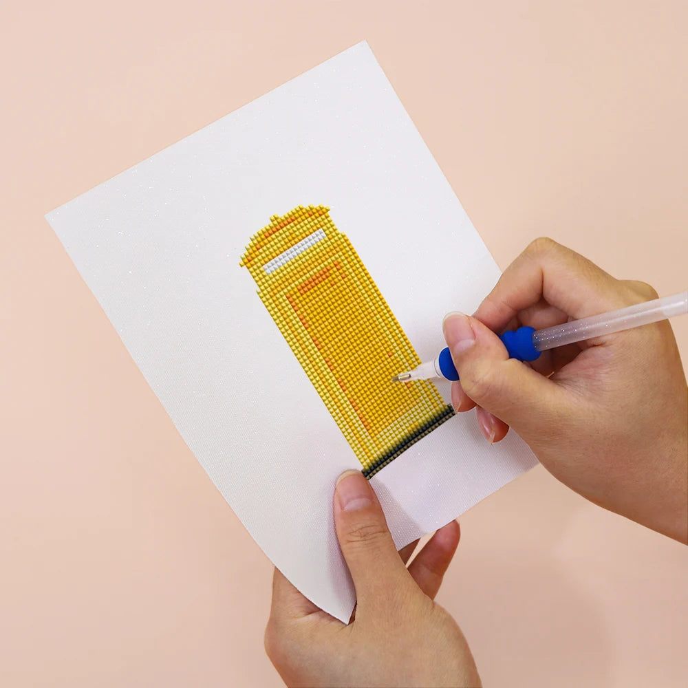 Applying drills to a City Street Icons mini diamond painting design