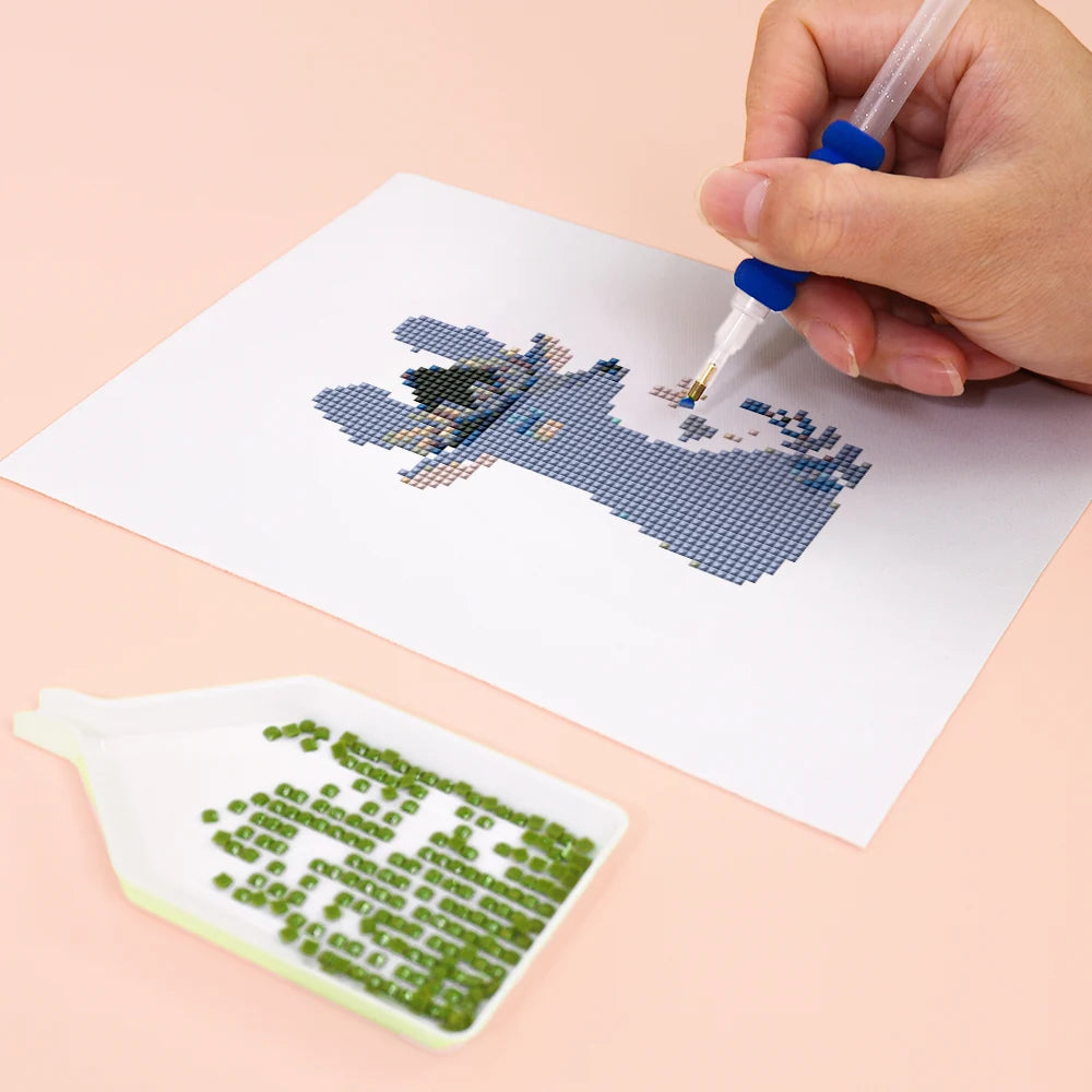 Close-up of drills being placed on a Colourful Animal Friends mini diamond painting design