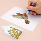 Close-up of drills being placed on a Colourful Birds mini diamond painting design
