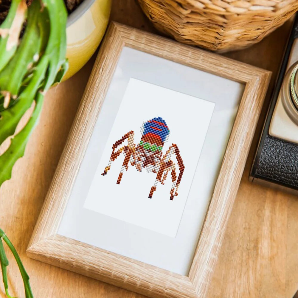 Colourful Spiders mini diamond painting design displayed in a decorative room setting