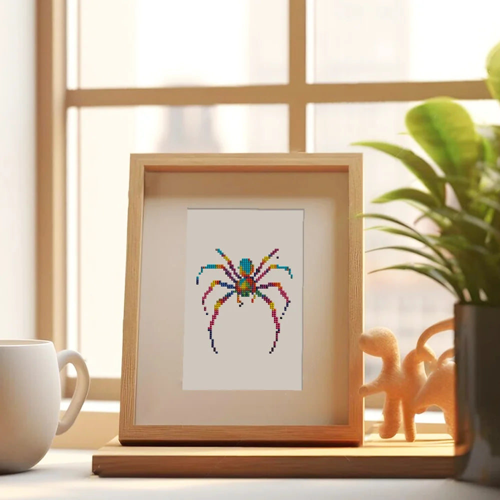 Framed Colourful Spiders mini diamond painting artwork presented as finished decor