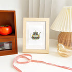 Completed Colourful Teapots mini diamond painting shown as framed decor