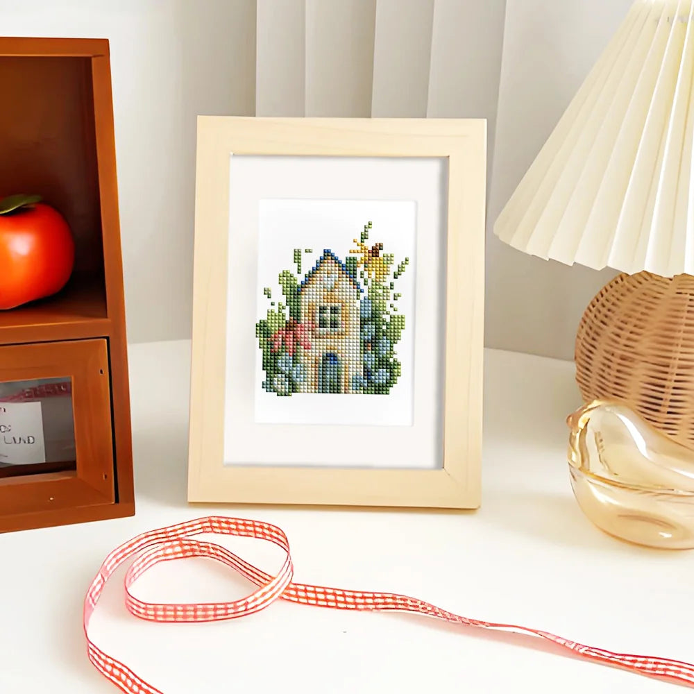Completed Cottage Garden Teacups mini diamond painting shown as framed decor