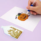Close-up of drills being placed on a Cute Halloween Monsters mini diamond painting design