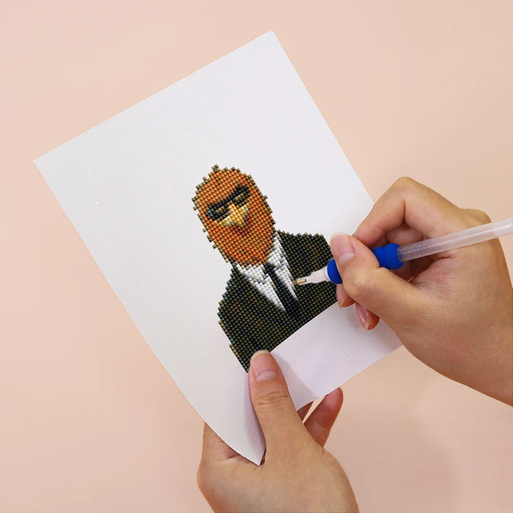Applying drills to a Dapper Animal Gentlemen mini diamond painting design