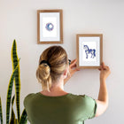 Framed Enchanted Blue Fantasy mini diamond painting artwork displayed in a styled setting