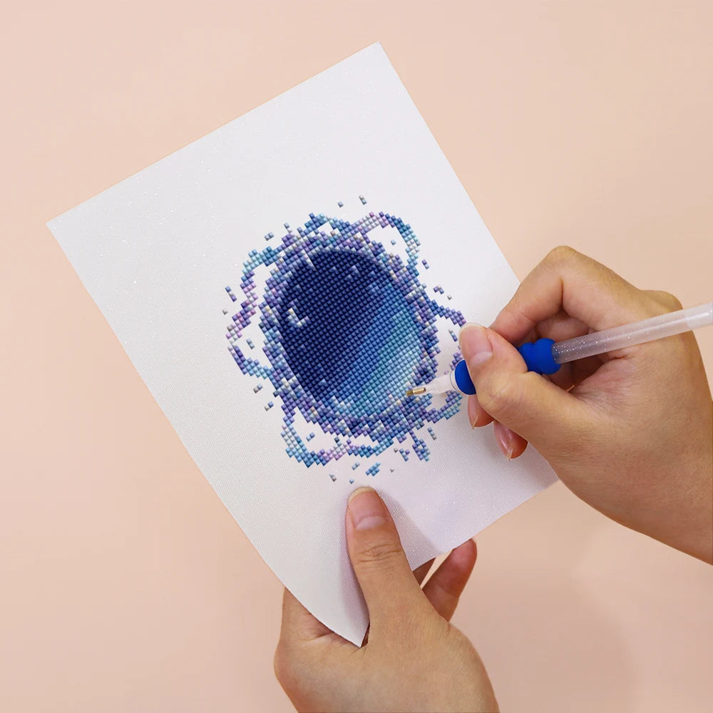Applying drills to a Enchanted Blue Fantasy mini diamond painting design