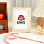 Festive Christmas Characters mini diamond painting design displayed in a decorative room setting