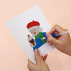 Applying drills to a Festive Christmas Characters mini diamond painting design