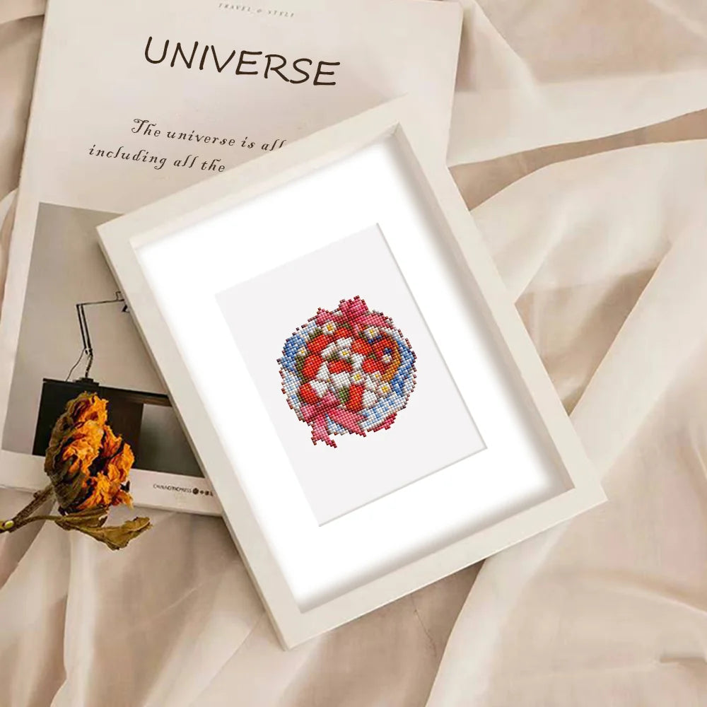 Completed Festive Ornaments & Gifts mini diamond painting shown as framed decor