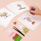 Working on several Floral Arrangements mini diamond painting designs with drills and applicator