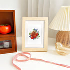 Completed Garden Harvest & Wreaths mini diamond painting shown as framed decor