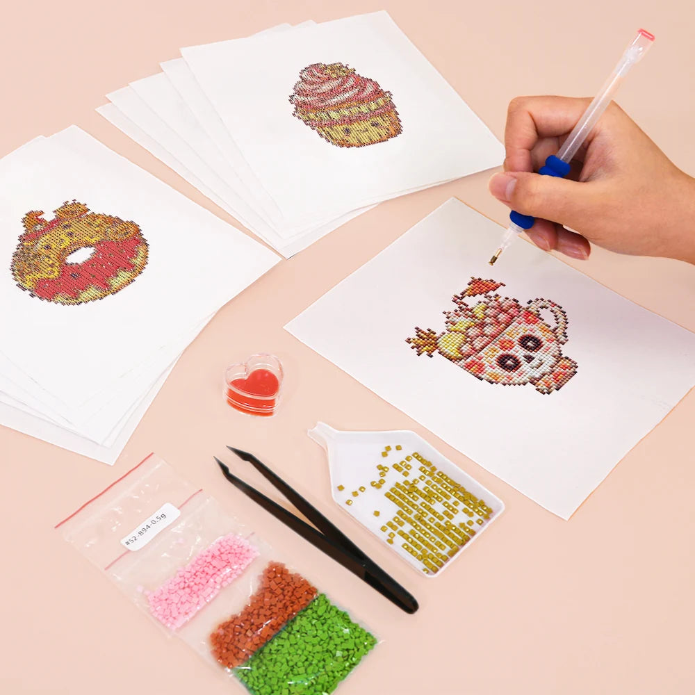 Working on several Kawaii Cakes & Desserts mini diamond painting designs with drills and applicator