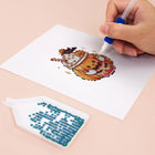 Close-up of drills being placed on a Kawaii Cakes & Desserts mini diamond painting design