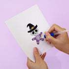Applying drills to a Kawaii Halloween Creatures mini diamond painting design