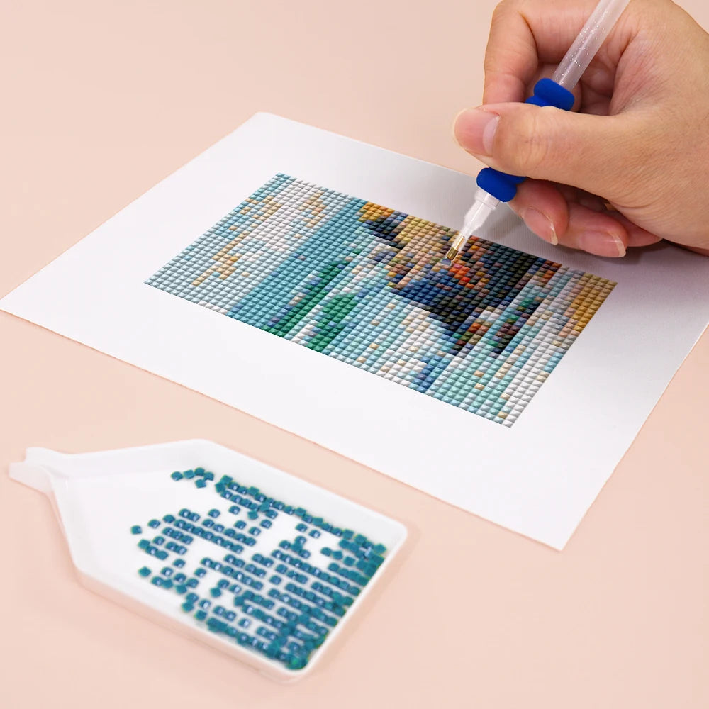 Close-up of drills being placed on a Modern Abstract Landscapes mini diamond painting design