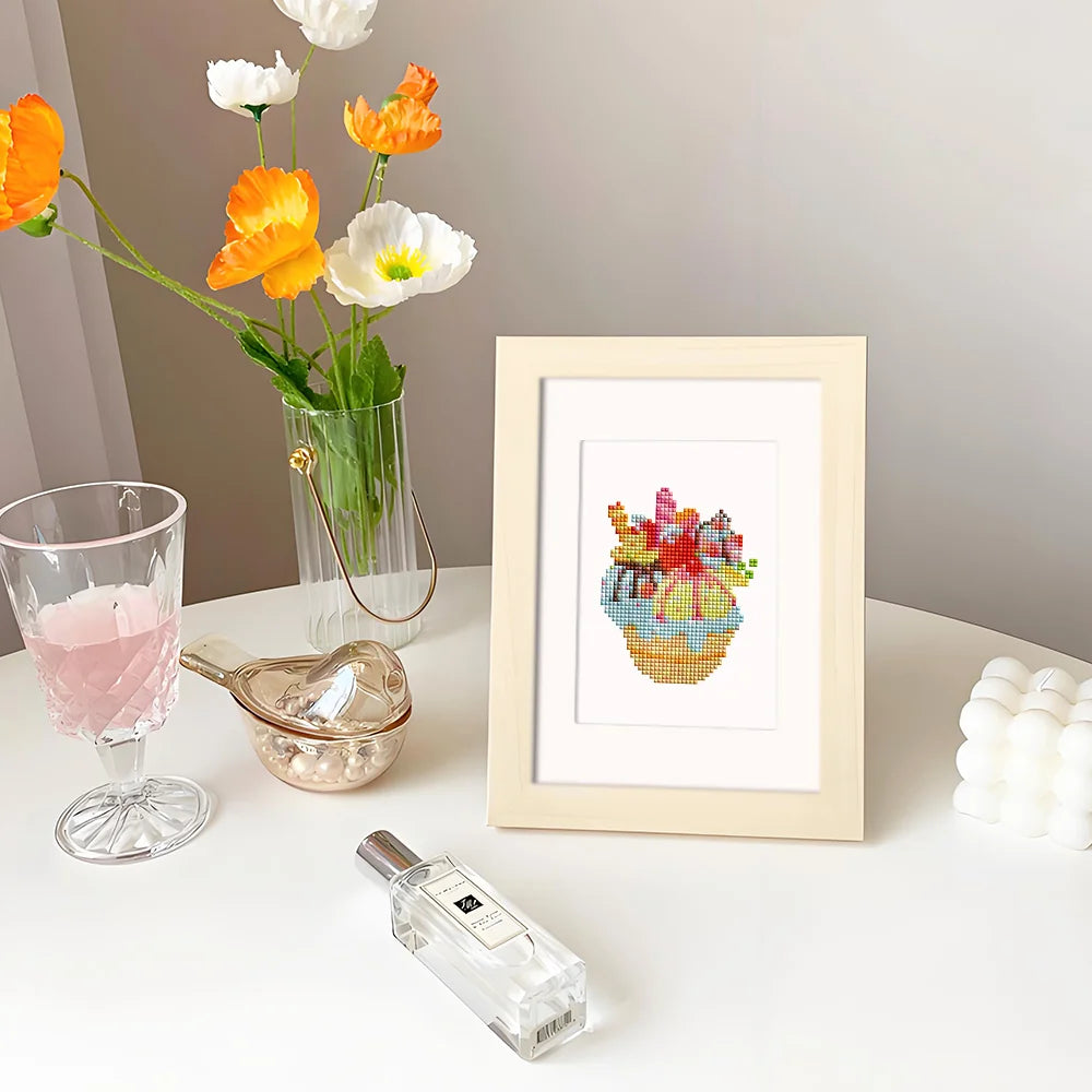 Completed Pastel Desserts mini diamond painting shown as framed decor