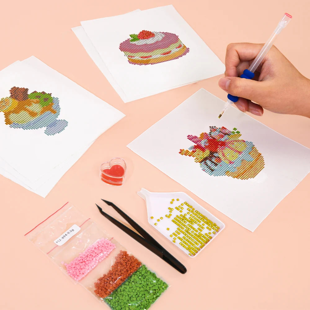 Working on several Pastel Desserts mini diamond painting designs with drills and applicator