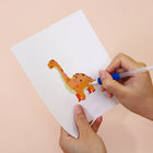 Applying drills to a Playful Dinosaurs mini diamond painting design