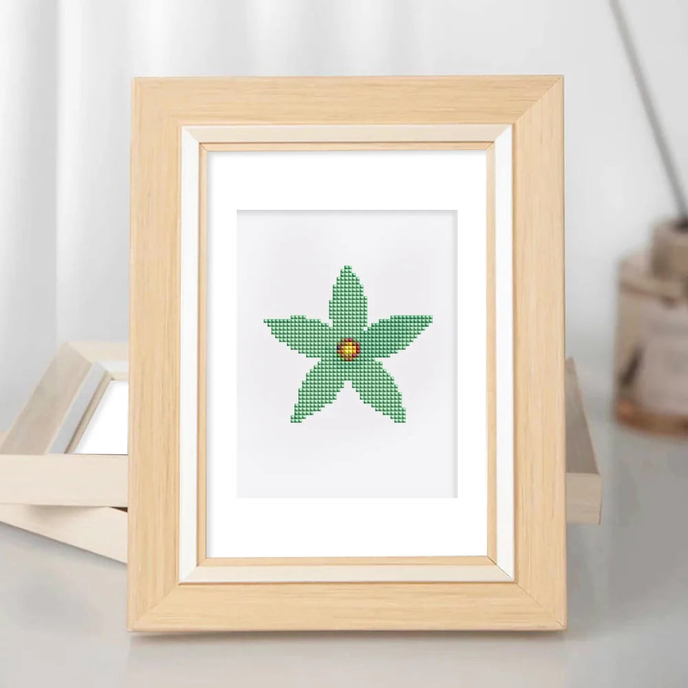 Framed Star Blooms mini diamond painting artwork displayed in a styled setting