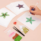 Working on several Star Blooms mini diamond painting designs with drills and applicator