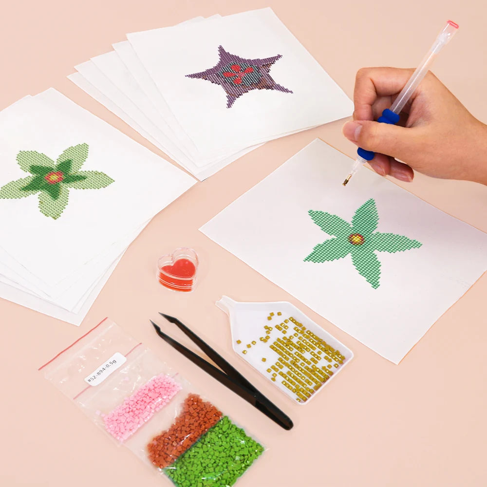 Working on several Star Blooms mini diamond painting designs with drills and applicator
