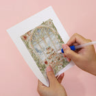 Applying drills to a Vintage Christmas Windows mini diamond painting design