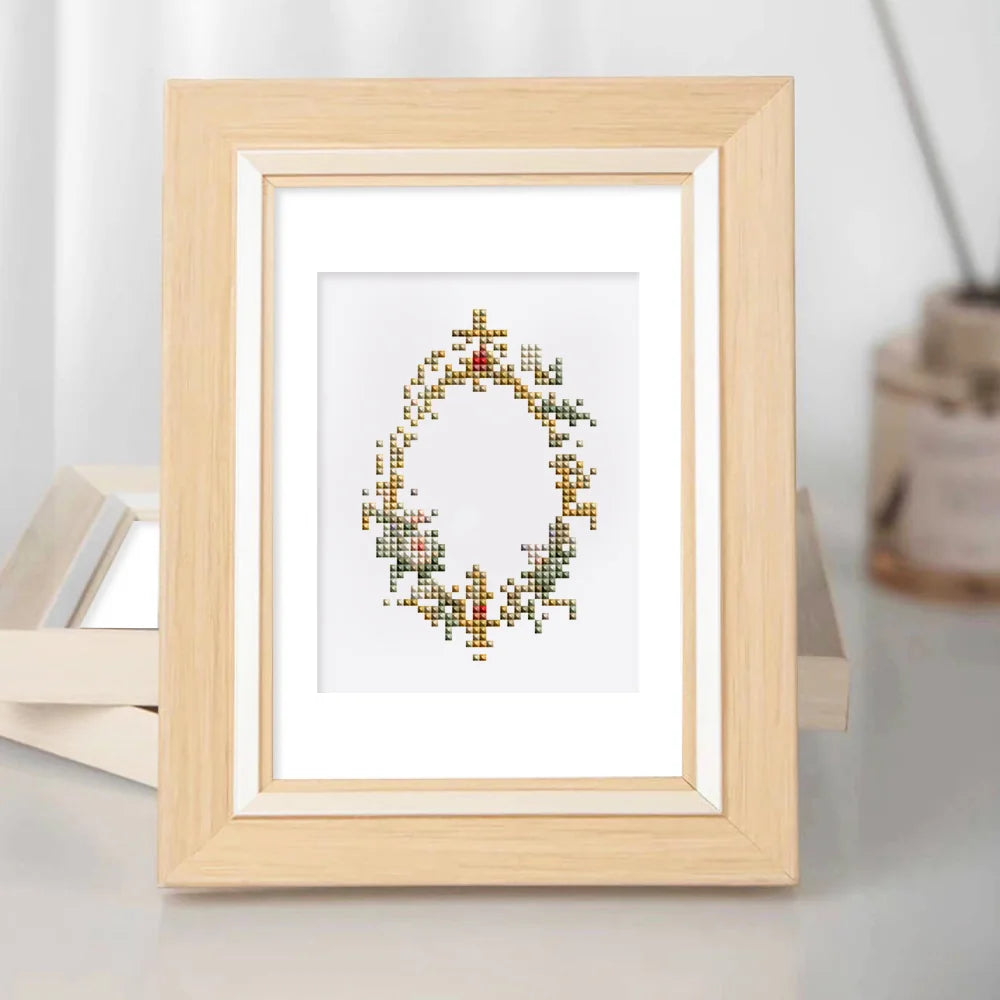 Framed Vintage Floral Frames mini diamond painting artwork displayed in a styled setting
