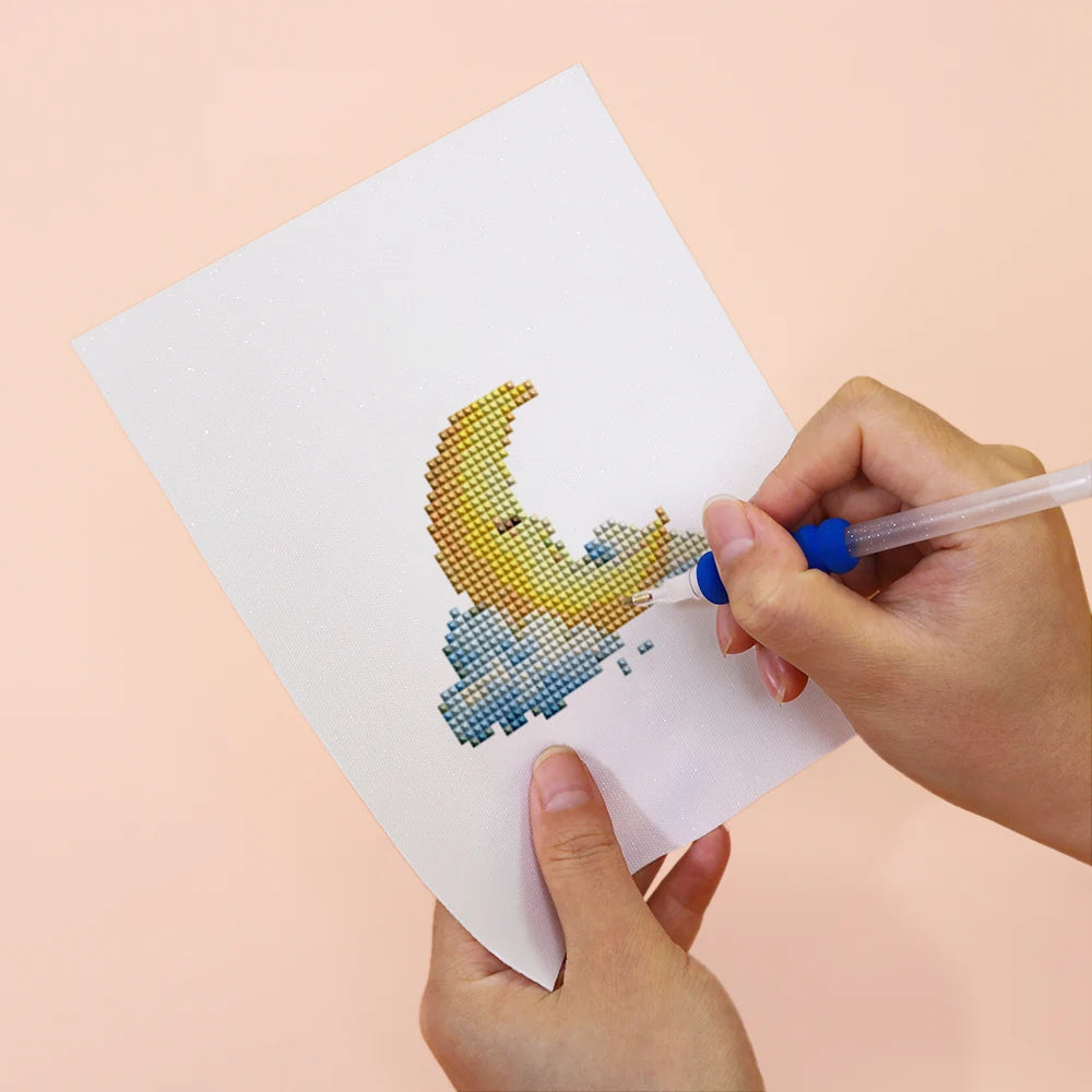 Applying drills to a Whimsical Cottage Finds mini diamond painting design