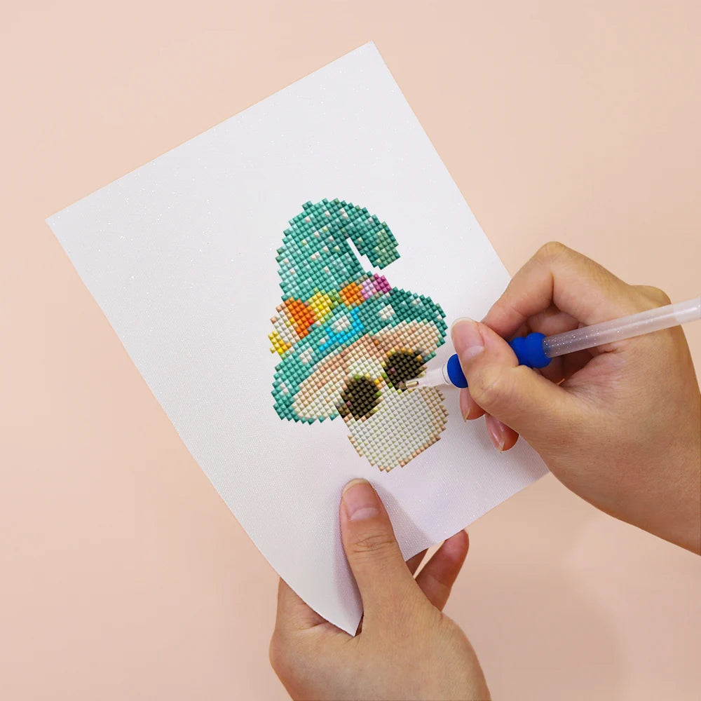 Applying drills to a Whimsical Mushrooms mini diamond painting design
