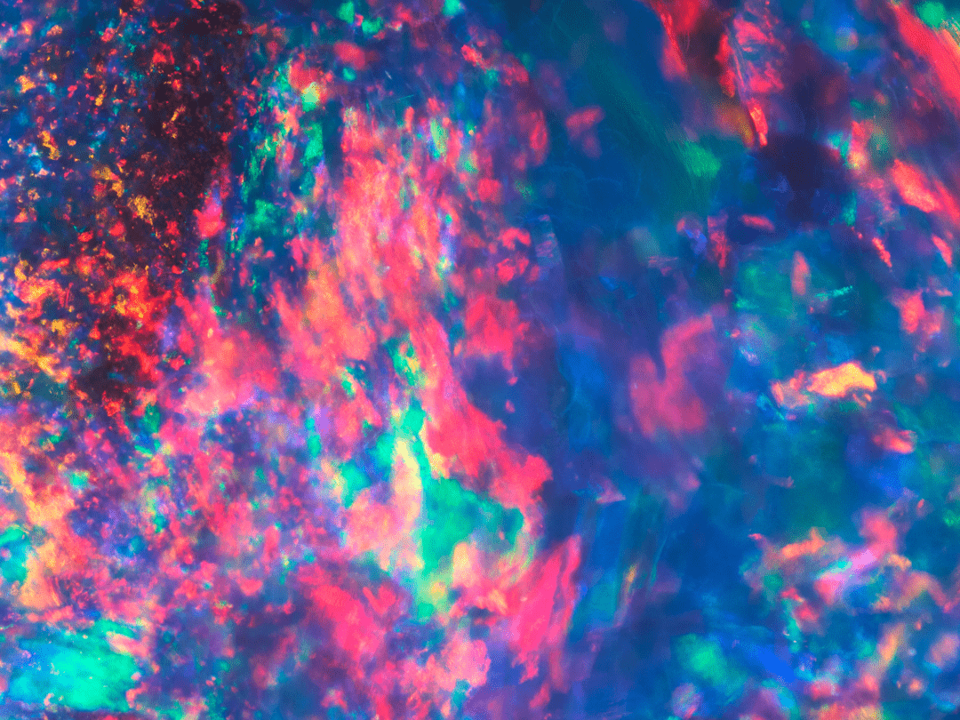 abstract multicoloured pattern beneath dark blue and purple colour fields
