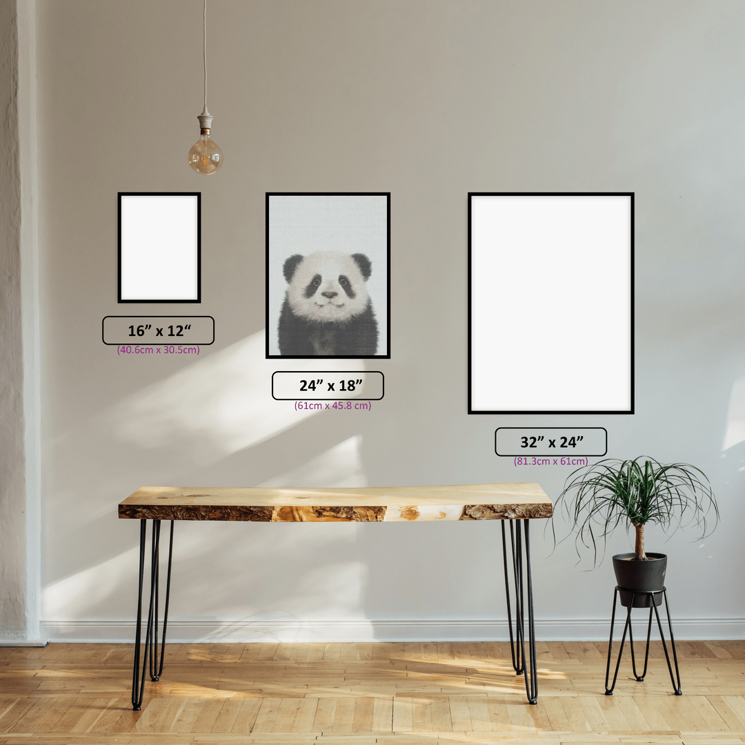 Panda diamond painting displayed in a room setting