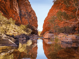 narrow body of water between steep rocky formations in rocky gorge